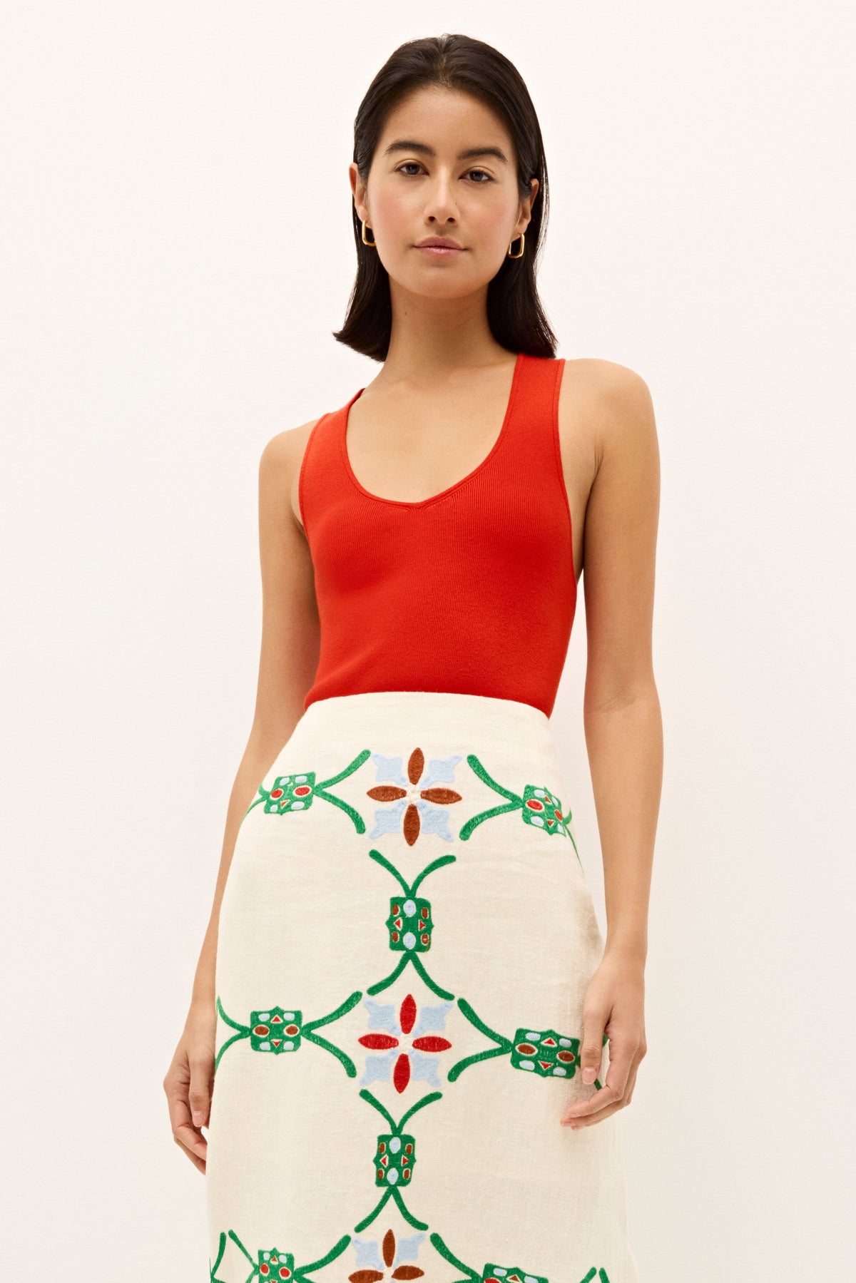 Vibrant red ribbed tank top with a flattering, minimal silhouette