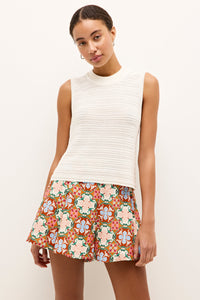 Sleeveless white knit tank top with a high crew neckline and textured ribbing