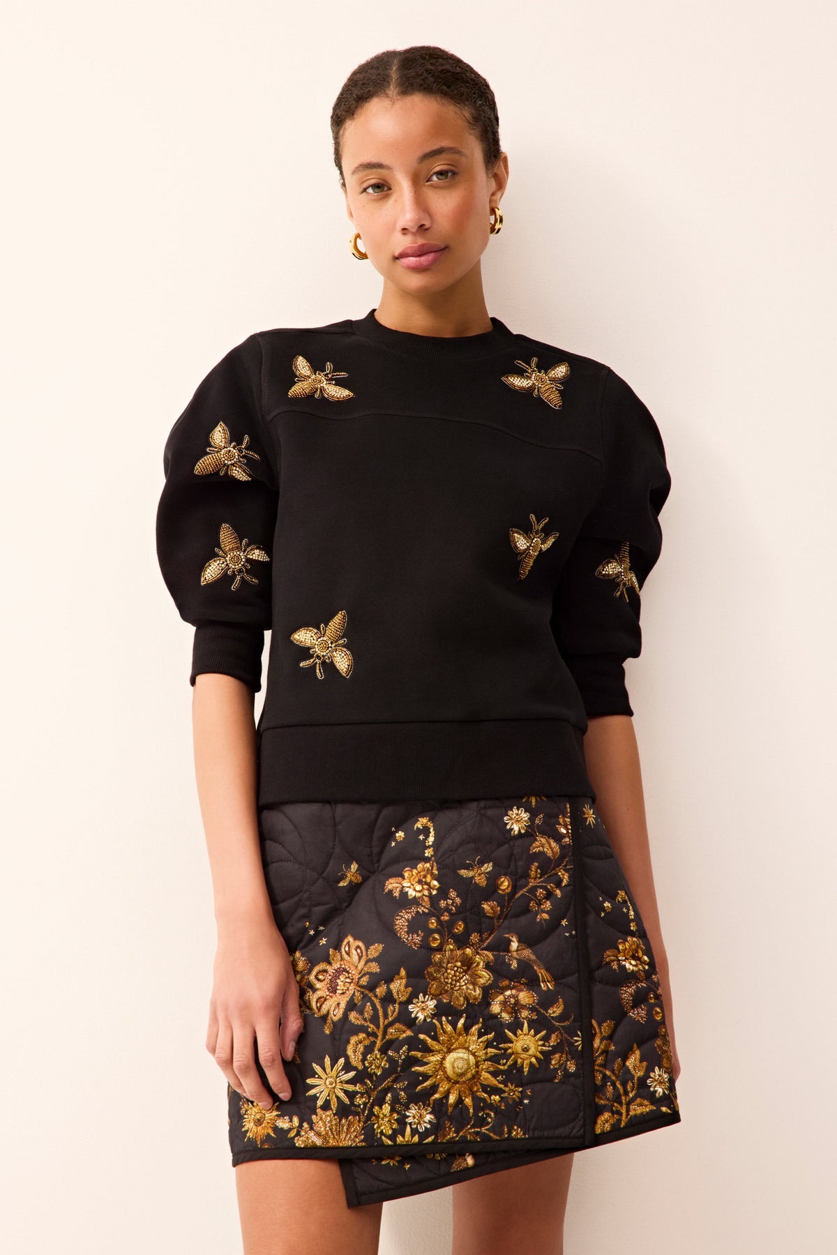 Puff half sleeve black sweater with bended embroidered bees all over 
