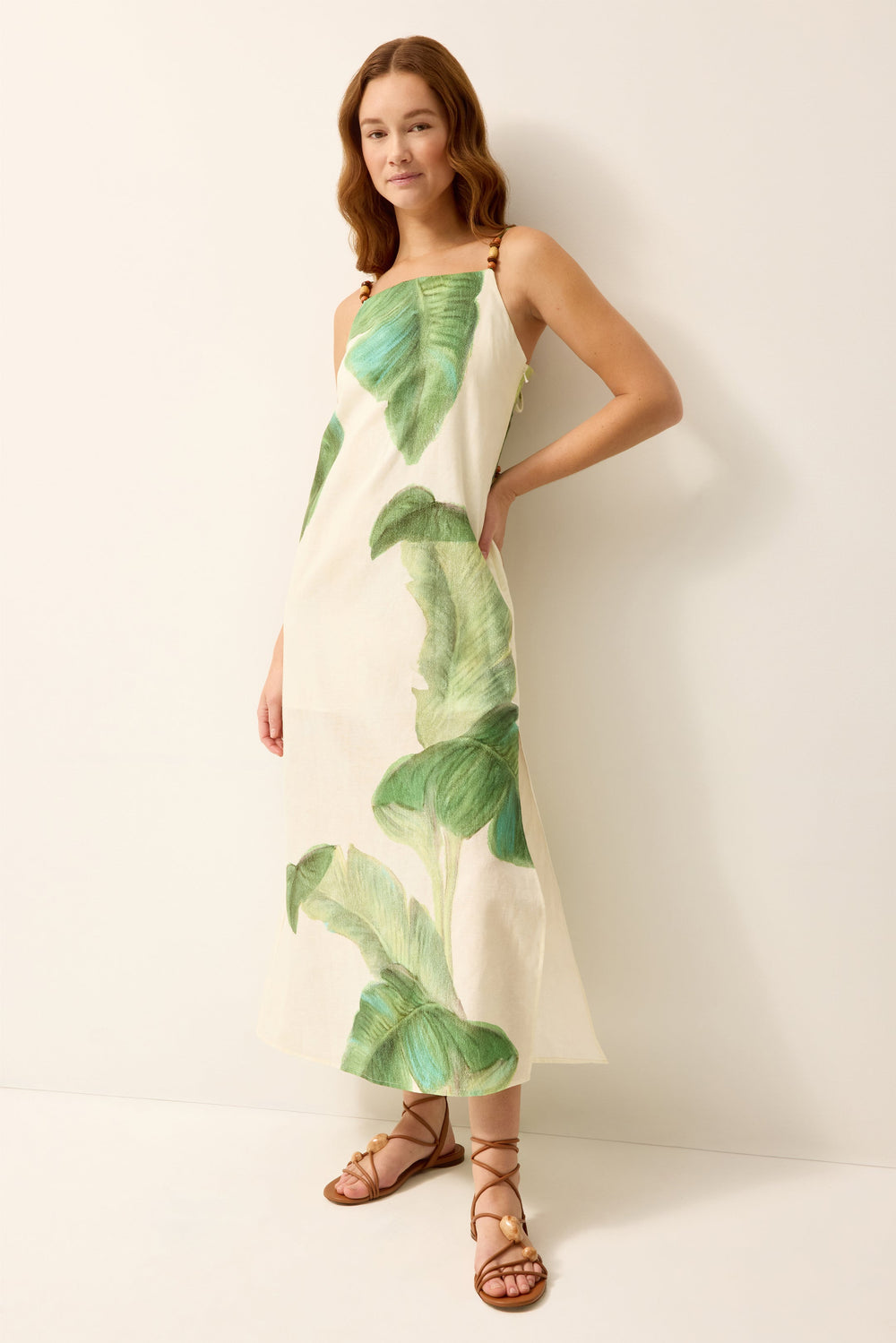 Green and white palm leaf printed column midi dress