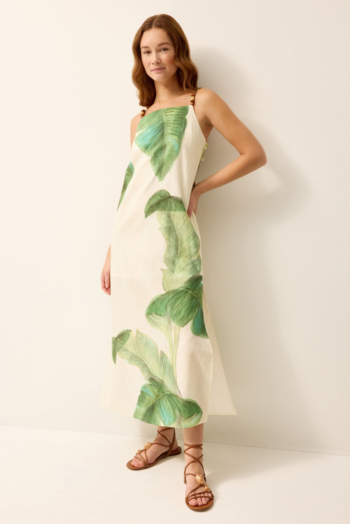 Green and white palm leaf printed column midi dress
