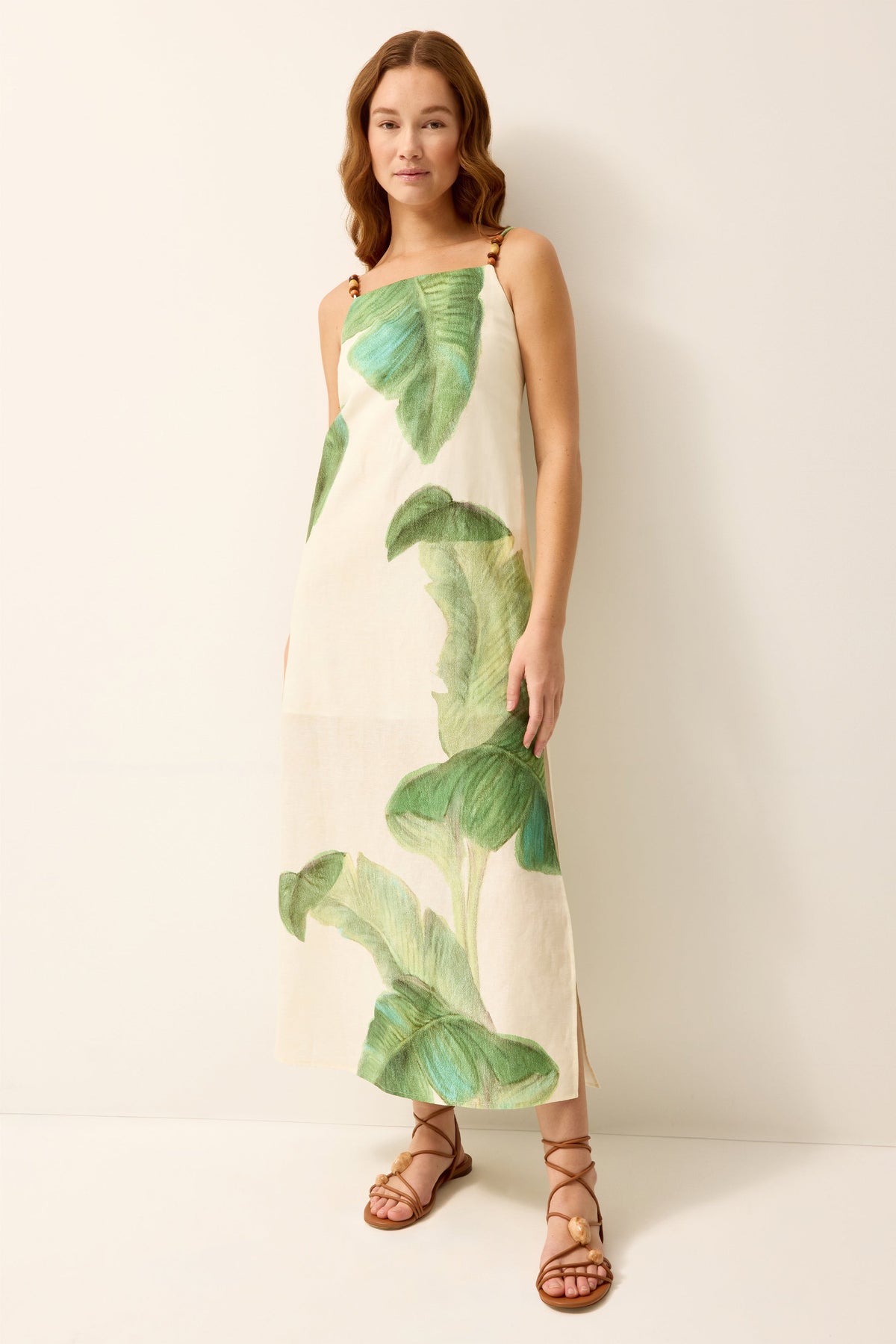 Tropical green and white midi dress with side slits 