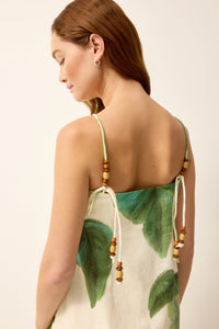 Green and white tropical printed midi dress with beaded straps