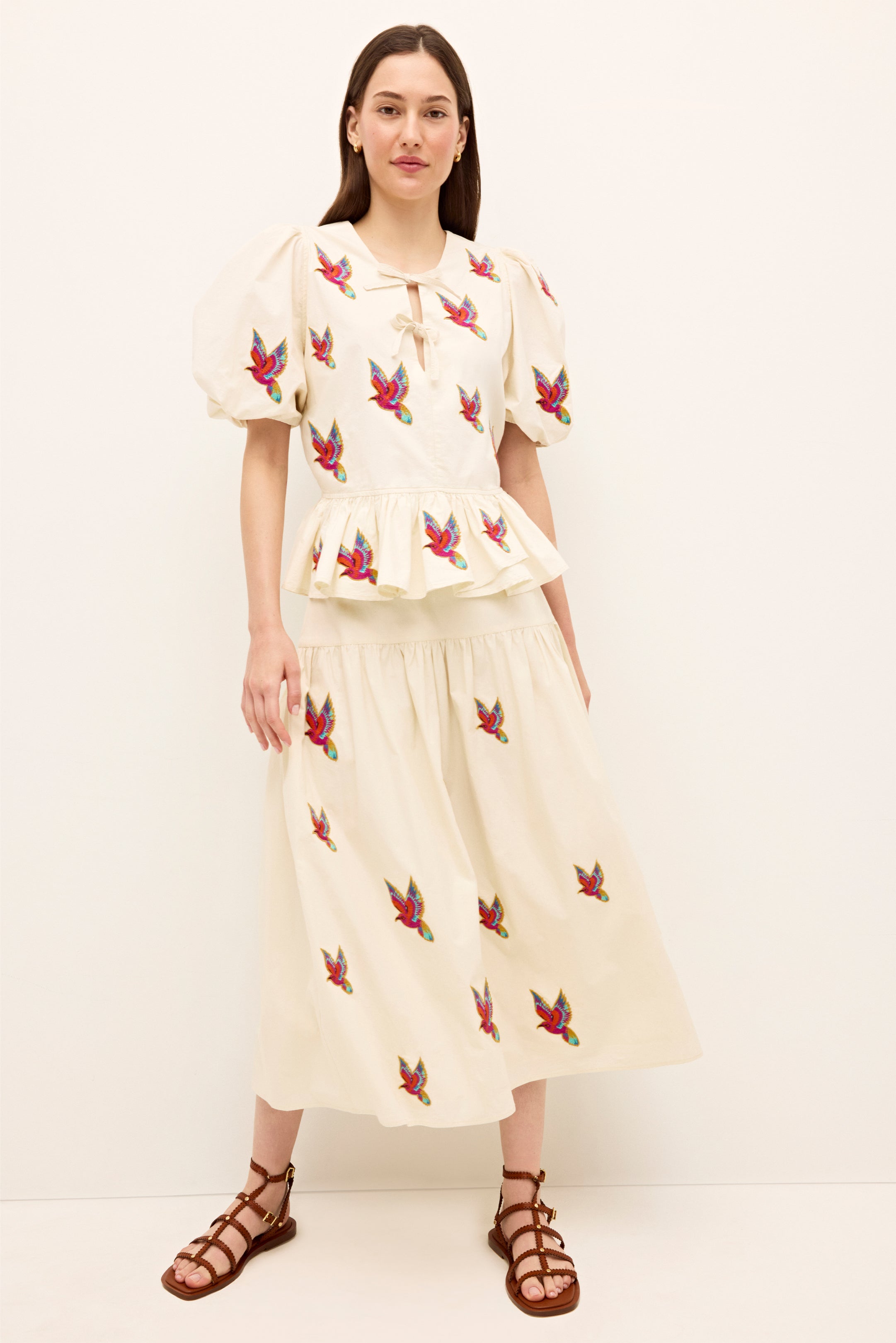 Cream midi skirt with playful multicolor bird accents and gathered waist 