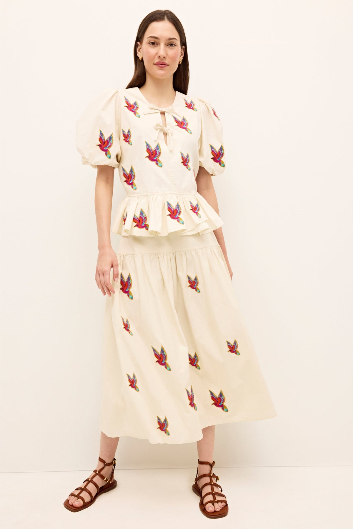 Cream midi skirt with playful multicolor bird accents and gathered waist 