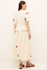 Lightweight white skirt with a full silhouette and tropical bird design 
