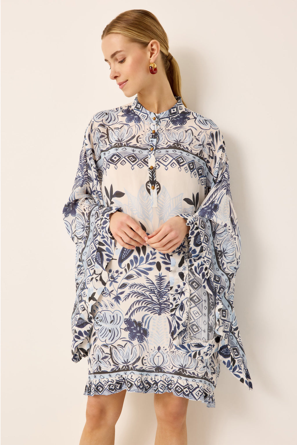 Blue and white printed caftan dress with ruffle trim detailing
