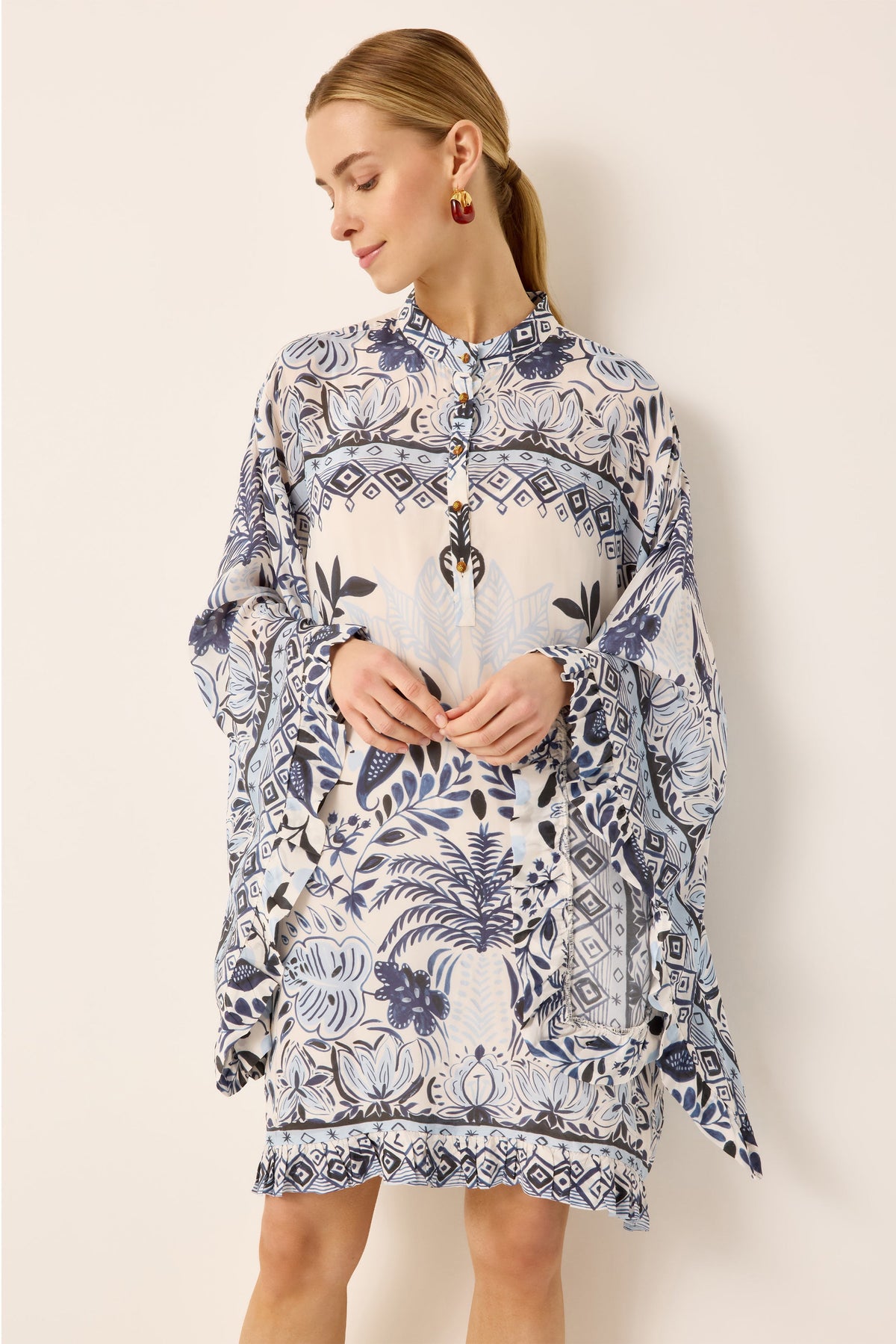 Blue and white printed caftan dress with ruffle trim detailing