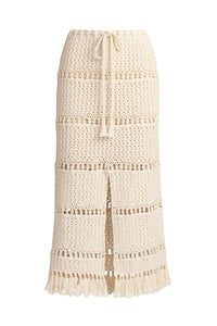 Neutral toned crochet skirt with structured lines, drawstring waist, and tassel hem