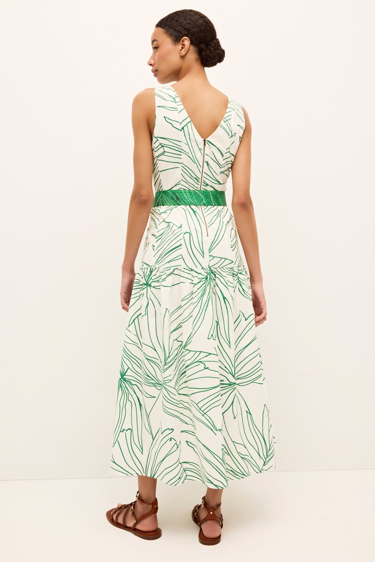 Flowy midi dress in a tropical print, perfect for beachside occasions 