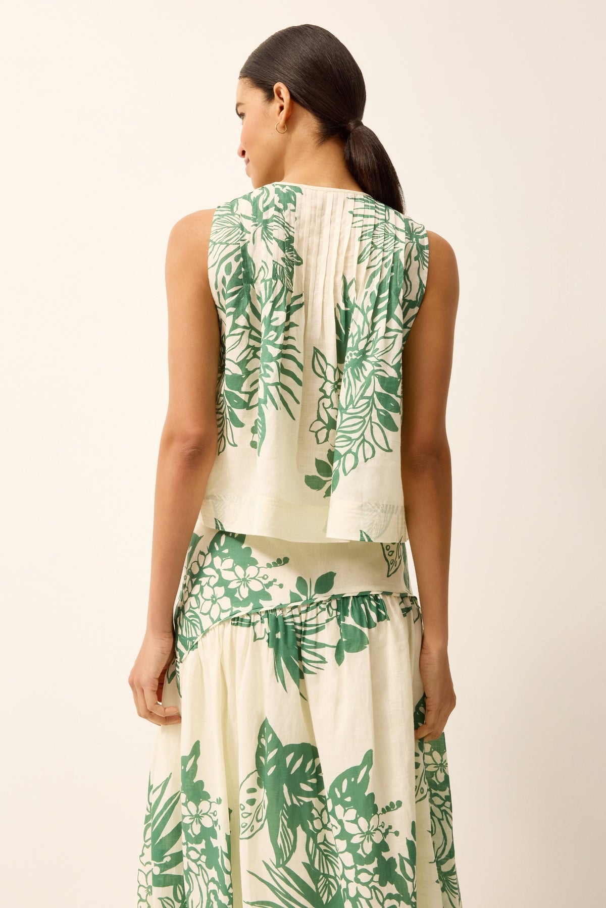 Green and white floral printed top with front ties