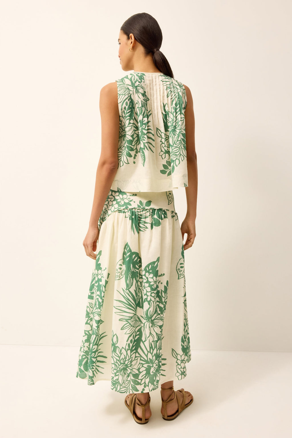 Sleeveless green and white floral printed top