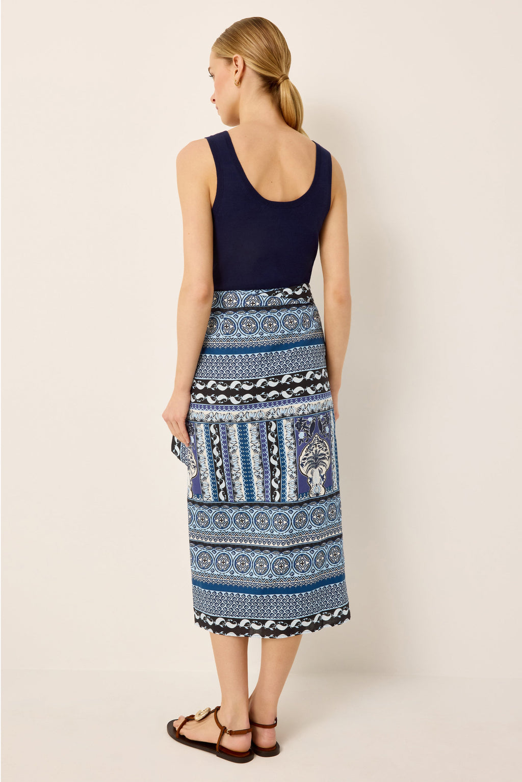 High waisted midi wrap skirt with a blue geometric print