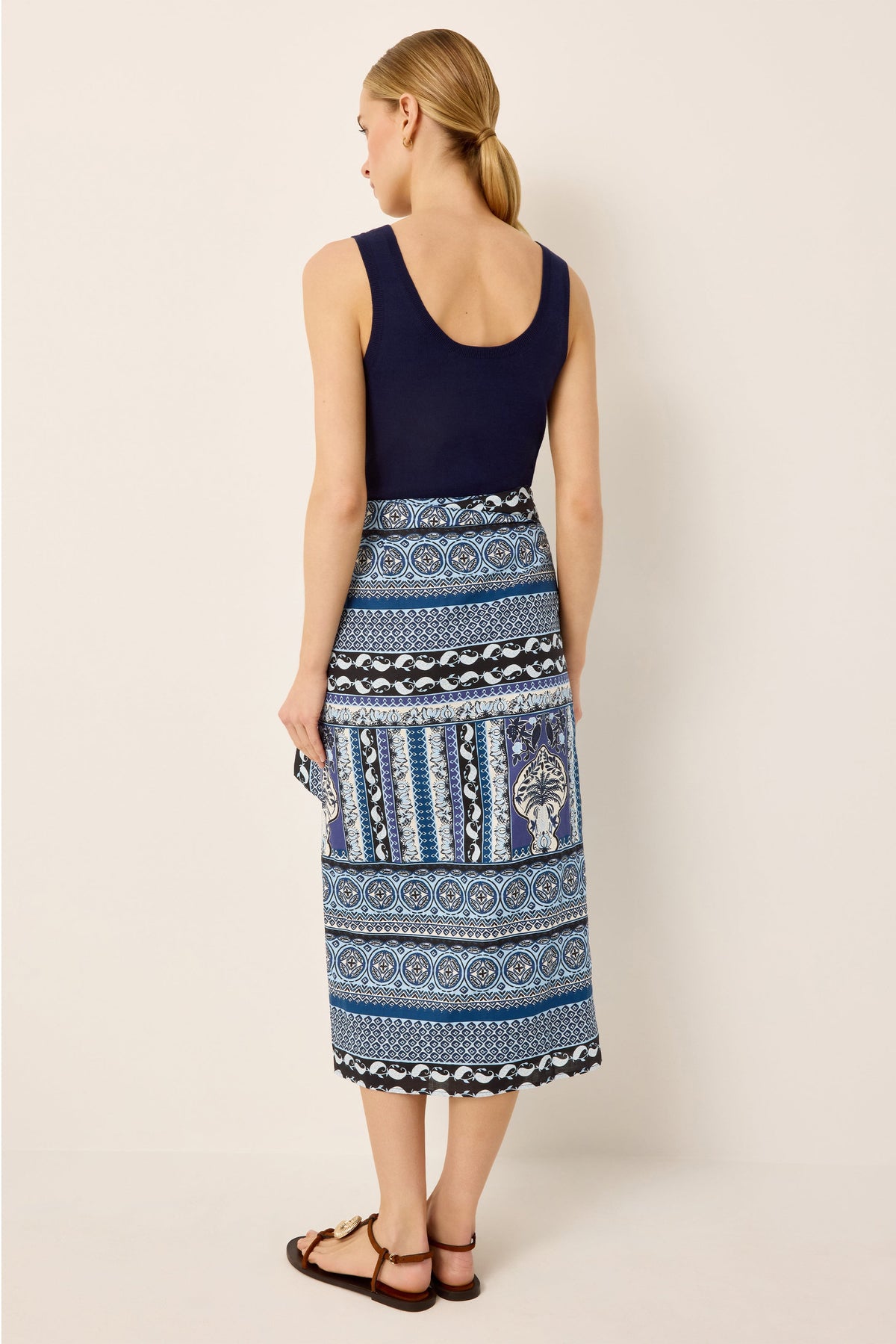High waisted midi wrap skirt with a blue geometric print