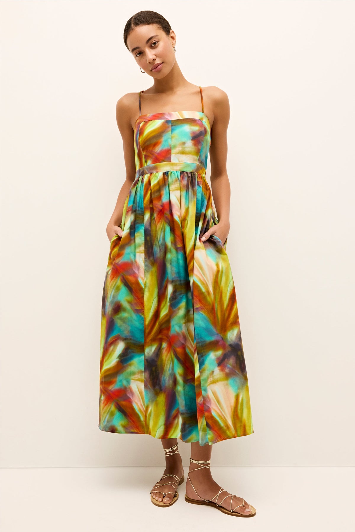 Sleeveless watercolor maxi dress with spaghetti straps and a fitted bodice 