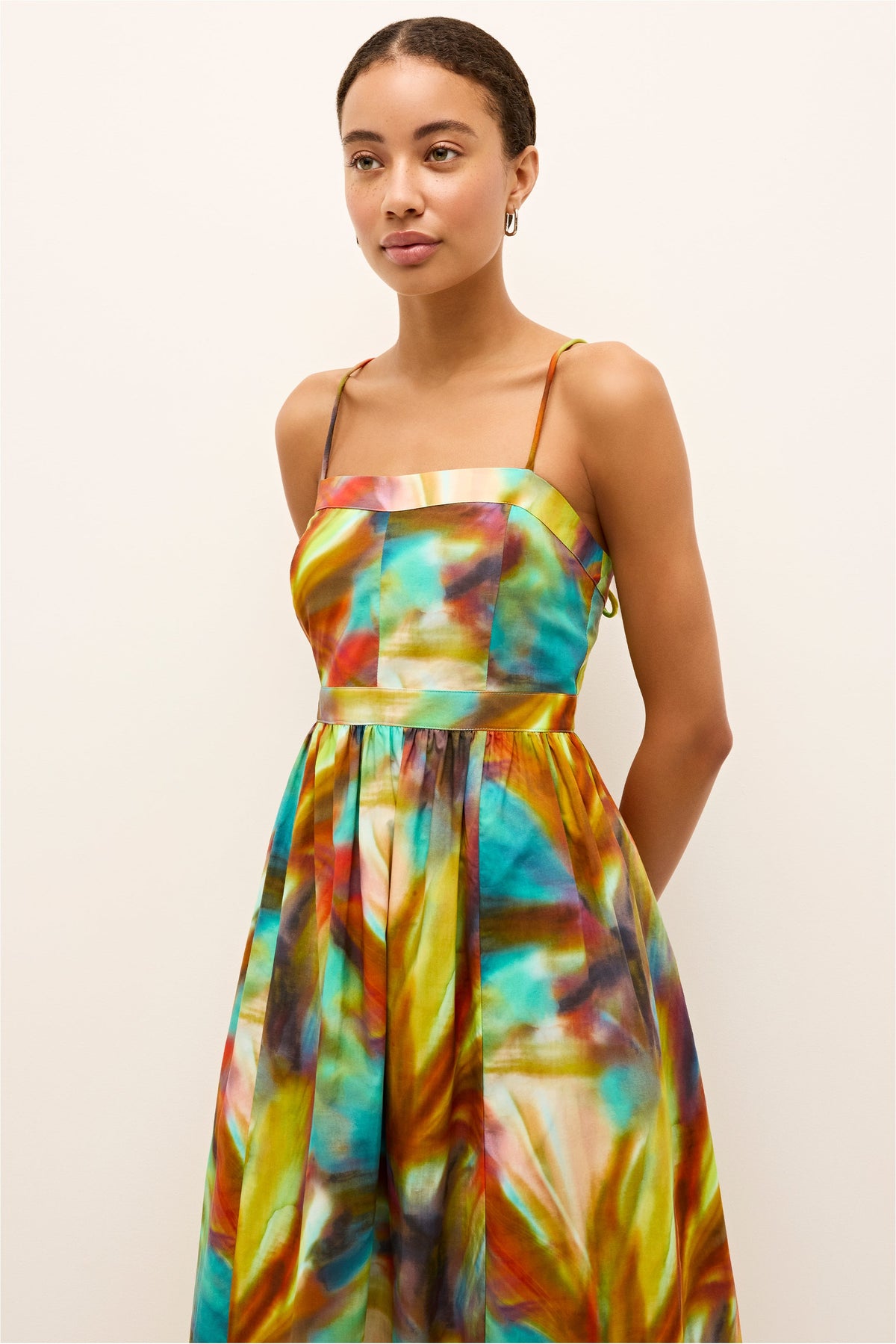 Maxi dress with vibrant painterly design, thin shoulder straps, and gathered waist 