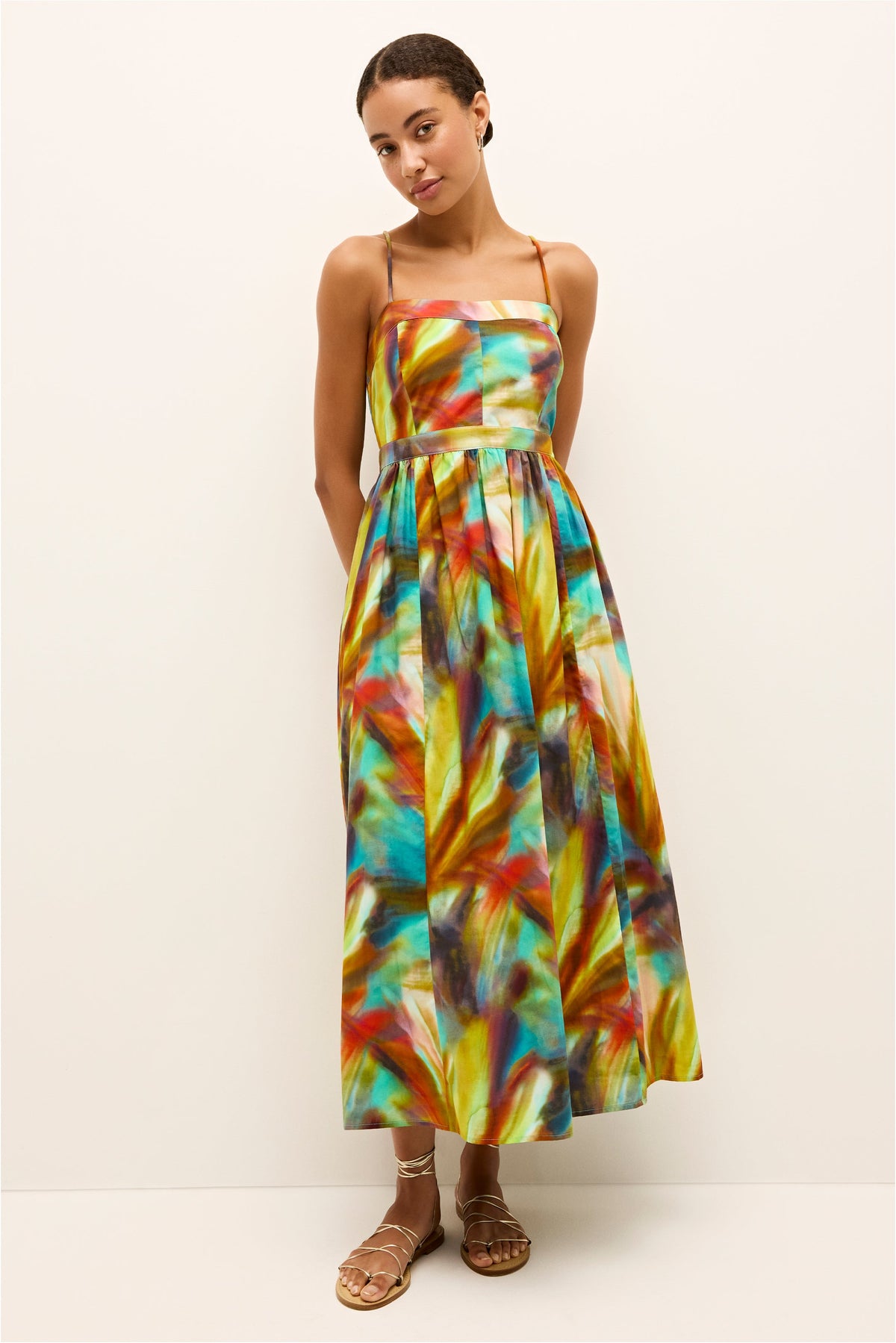 Elegant sundress in a bold tie-dye inspired pattern with a full skirt silhouette 