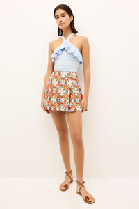 Fitted pastel blue top with ribbed hem and frill accented neckline