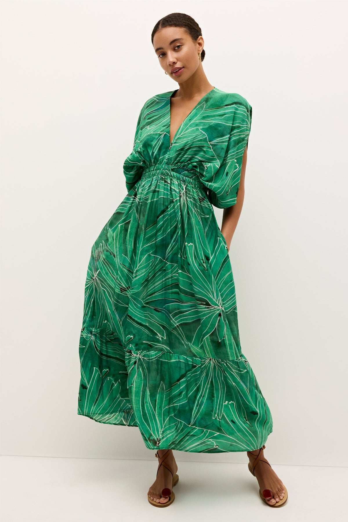 Green leaf print midi dress with cinched waist and v neck