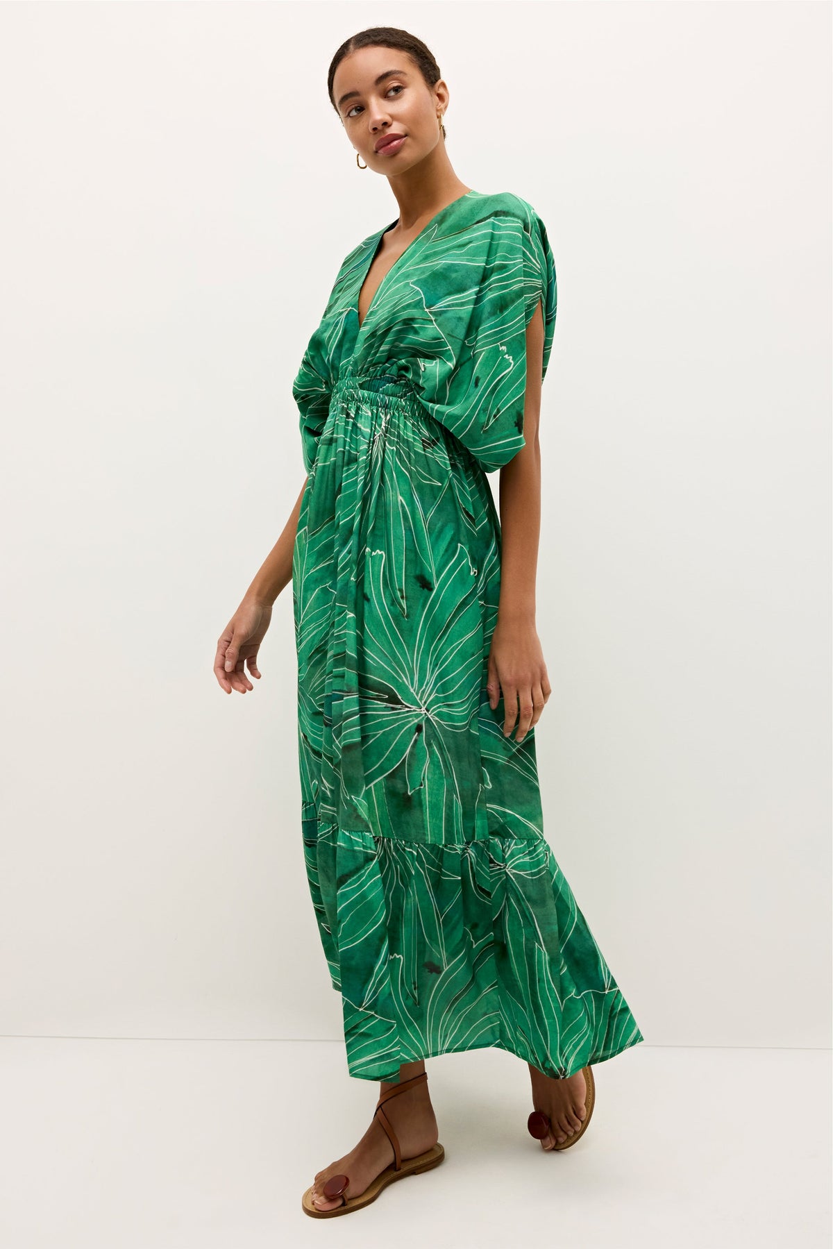 Tiered green dress with elastic waist and white leaf line print