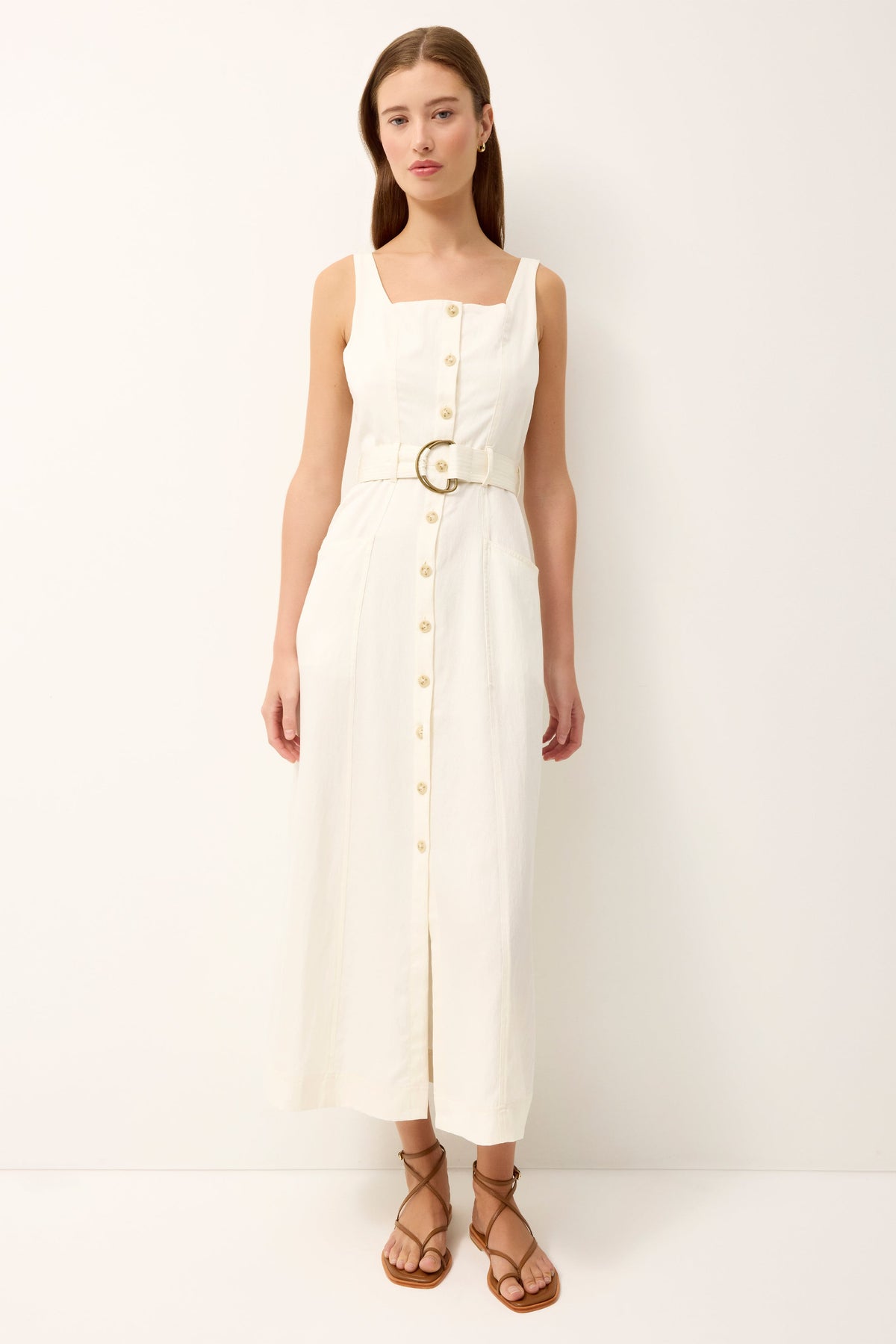 Front view of Whitner Dress in ivory on model showcasing square neckline, button-front, D-ring belt, front pockets, A-line midi