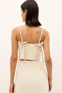 Soft neutral top with graphic flora embroidery and tie sleeves