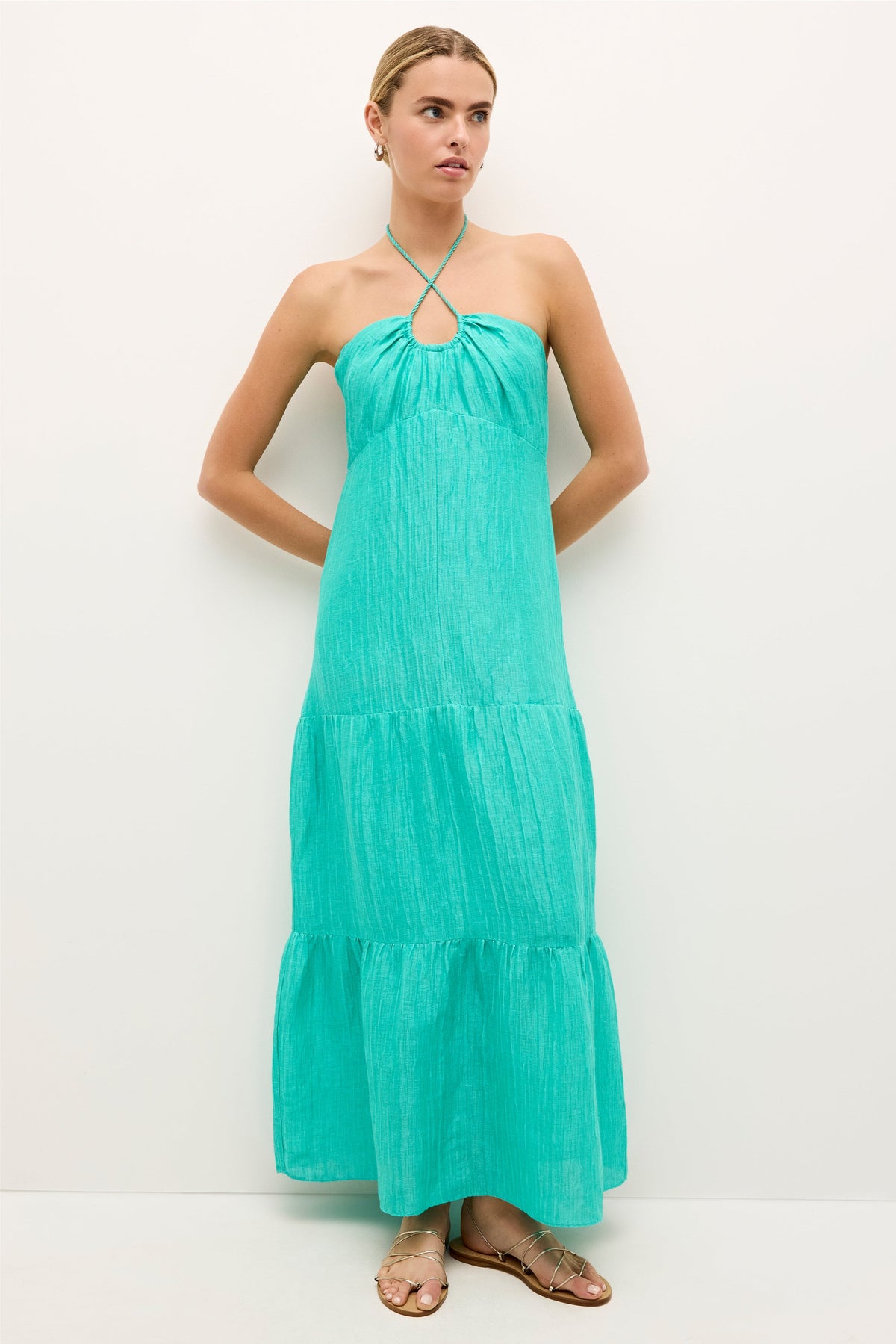 Turquoise halter neck maxi dress with gathered bust and flowy tiers 