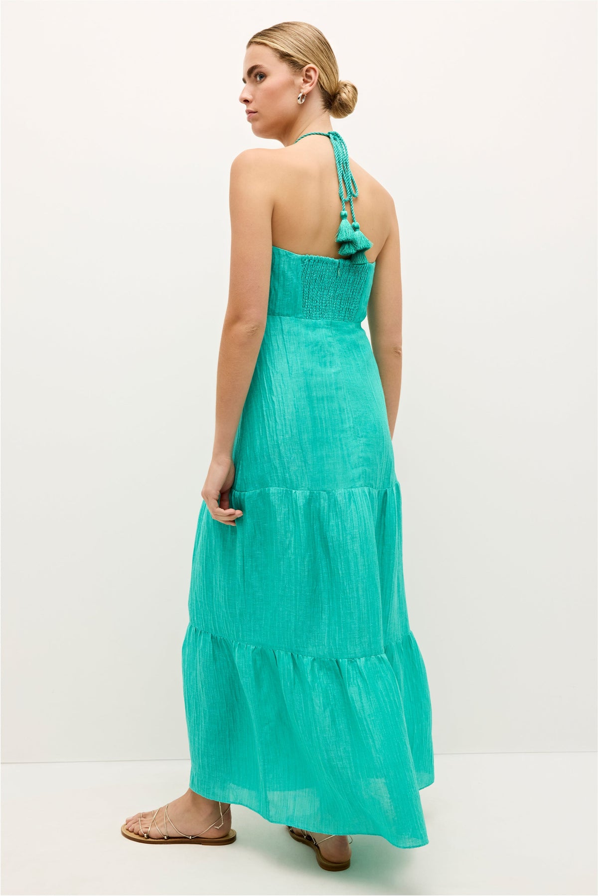 Maxi length dress in bright turquoise with a ruched bodice and airy fabric 