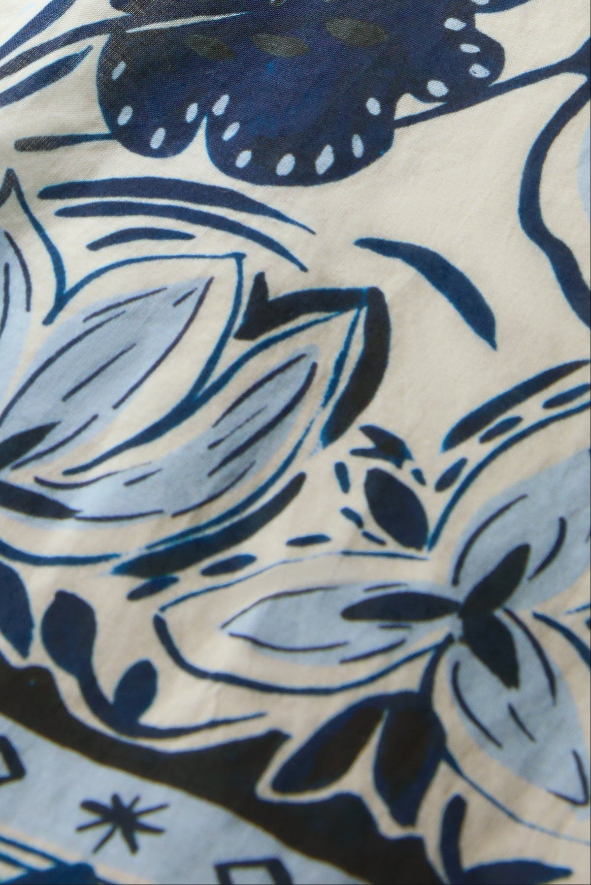 Blue and white midi skirt with tropical print