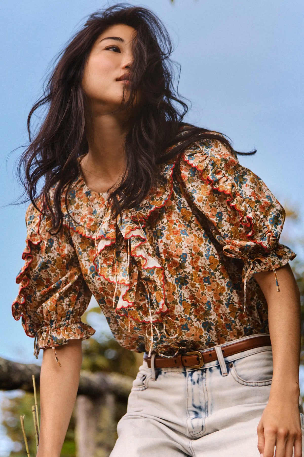 The Marigold Top in Gertrude paired with the Wray Pant in washed blue denim. 