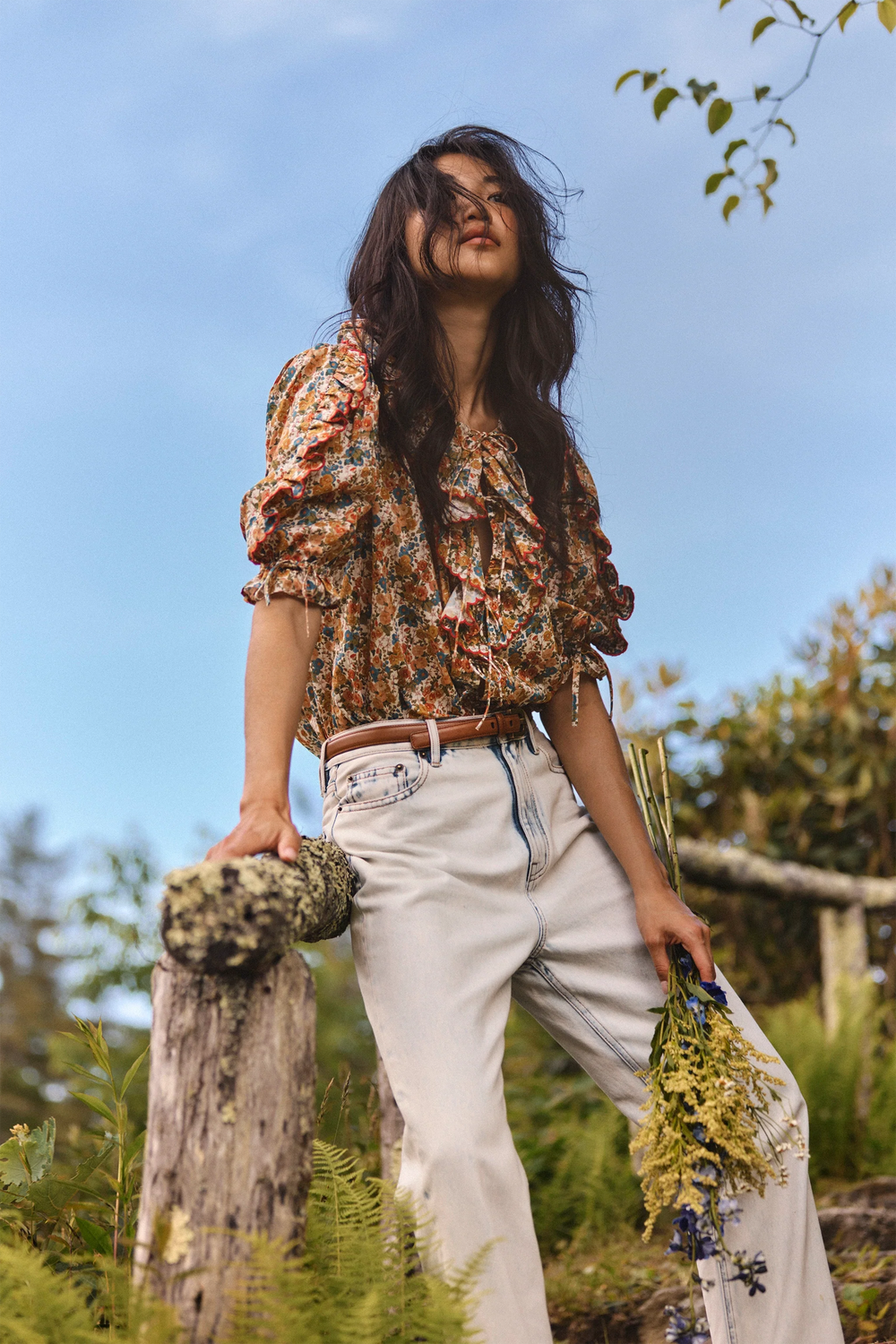 The Marigold Top in Gertrude paired with the Wray Pant in washed blue denim. 