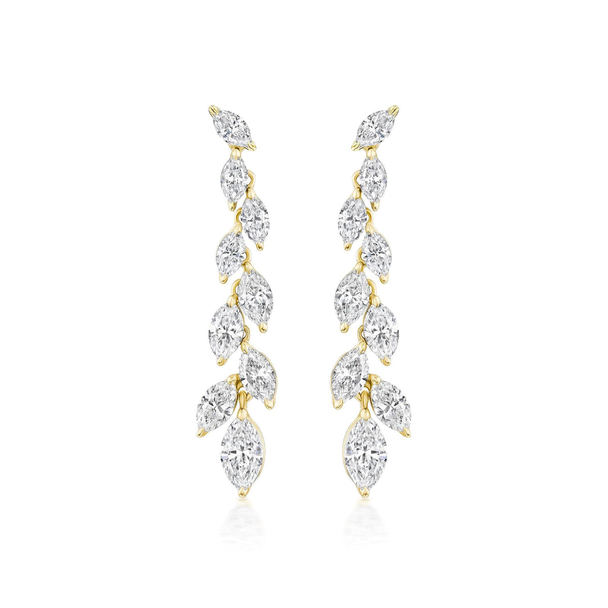 The Marquise Diamond Waterfall Drop Earrings showcase a vertical row of marquise cut diamonds in a leafy, vine-inspired gold design for a delicate, sparkling look.