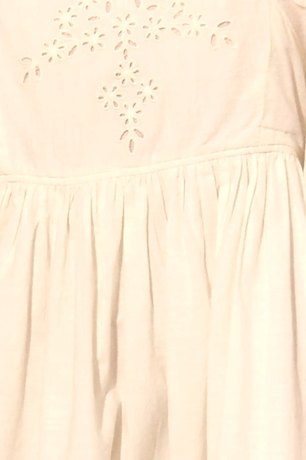 Close up of the Maya Dress in white.