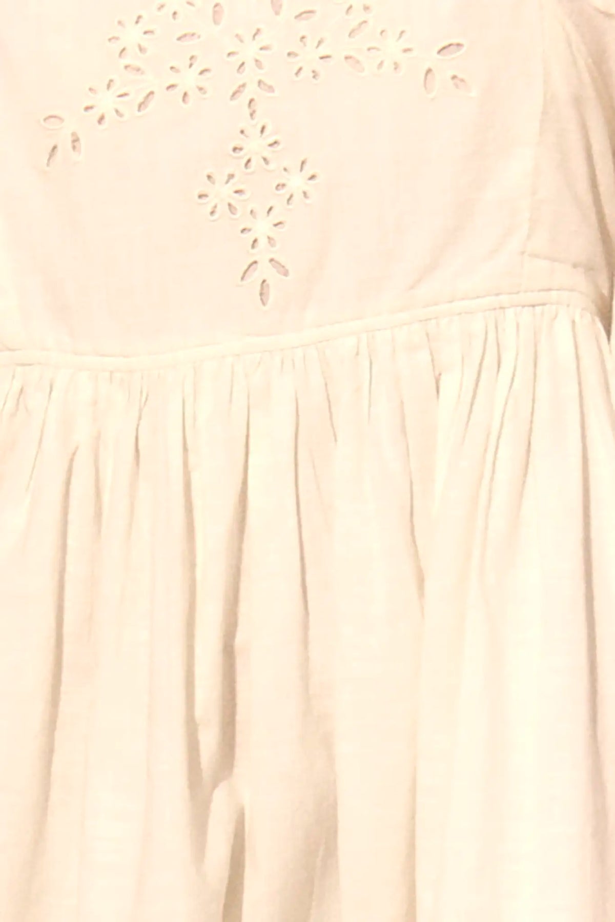 Close up of the Maya Dress in white.