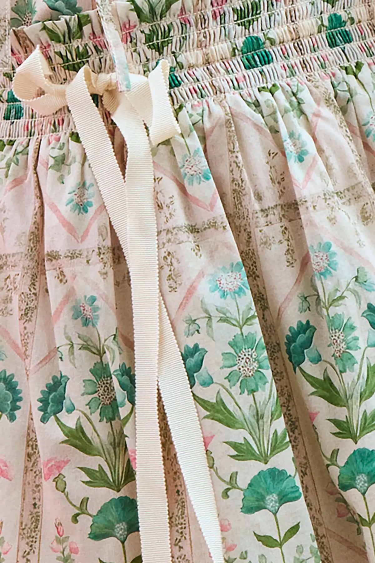 The Rosie Skirt in Pink Trellis paired with matching Kids Mayfair Top.