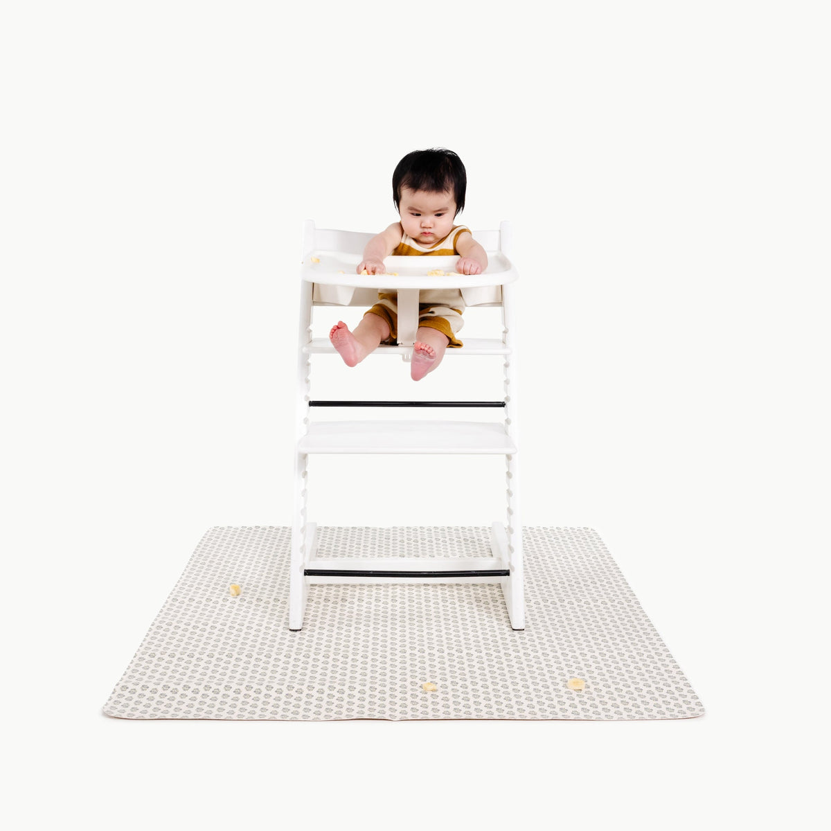 Meadow@baby in a highchair on the meadow mini