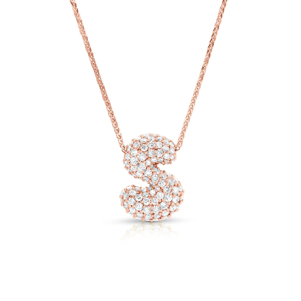 Front view of mini diamond bubble letter S necklace showing pave diamonds on 14k rose gold pendant against white background