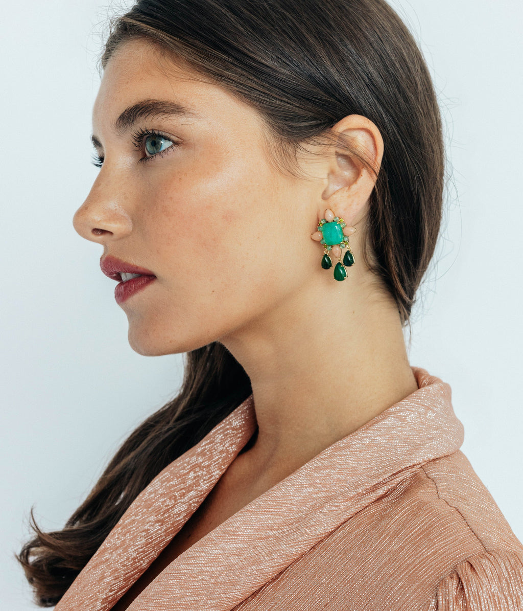 Side view of Montrose Earrings showcasing dangling jade and agate stones on a model against a light background