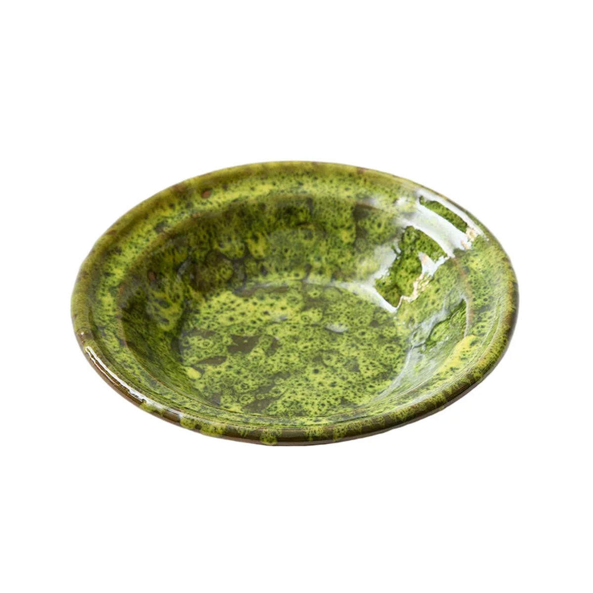 Three-quarter view of Moss Terracotta pasta dish with moss-inspired green speckled glaze on terracotta, white background
