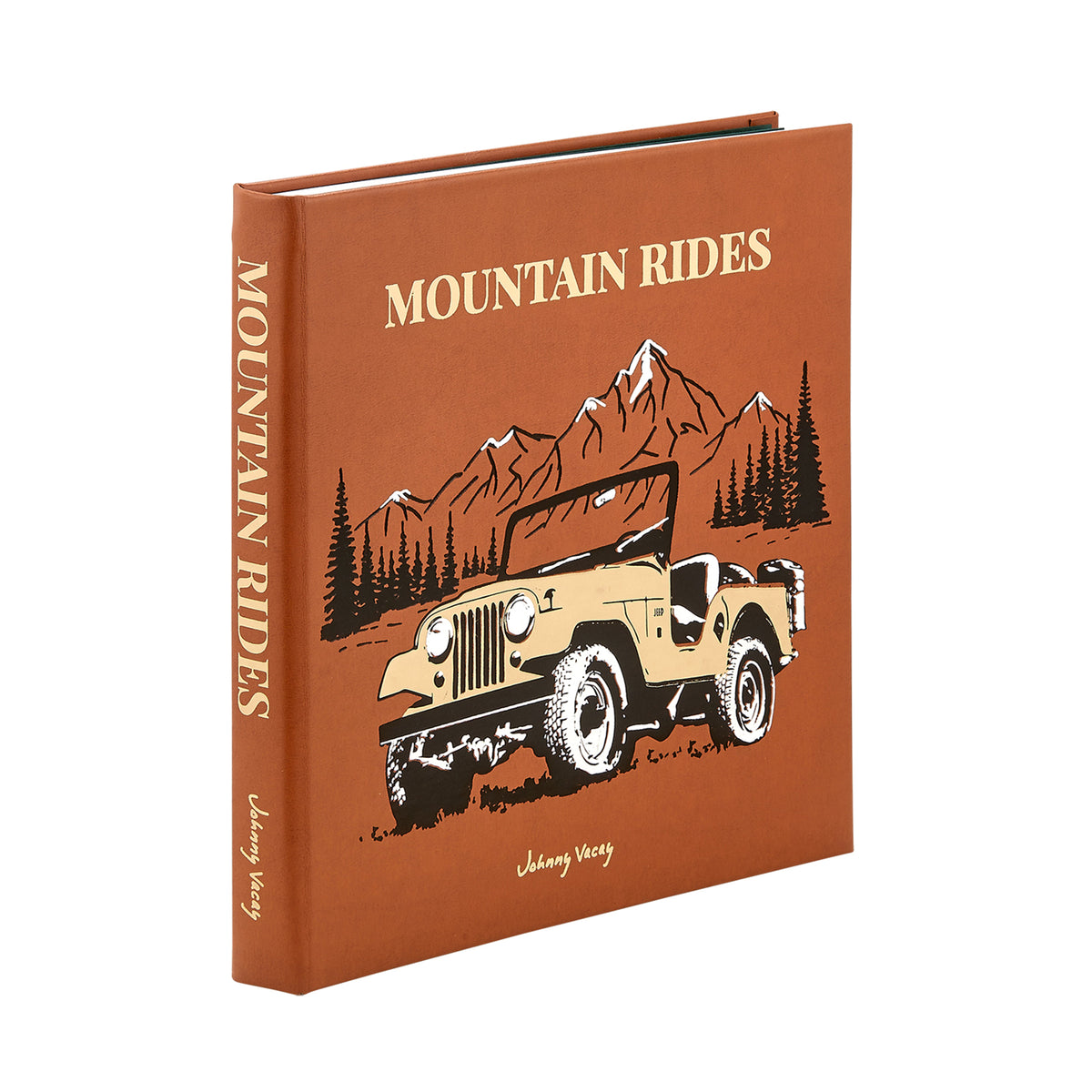 Angled view of Mountain Rides leather-bound hardcover by Johnny Vacay showing brown illustrated cover with a vintage 4x4 and mountain artwork