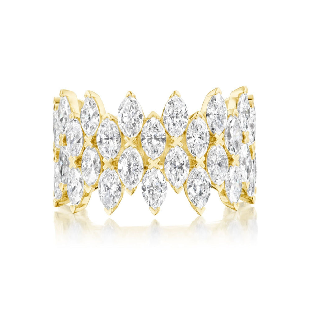 The Multi Tier Marquise Diamond Eternity Band showcases three rows of marquise-cut white diamonds set in 18k gold, arranged closely for an elegant and sparkling design across the entire band.