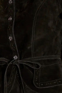 The Murphey Jacket has a button front, long sleeves with button cuffs, and a waist cinched by a belt