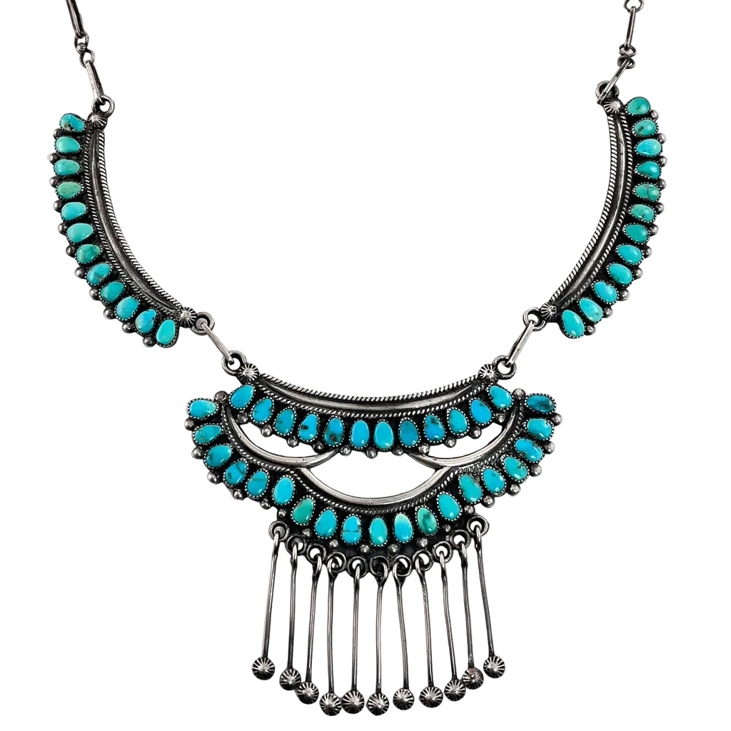 Front view of vintage three panel necklace with American turquoise, sterling silver, and dangling star studs