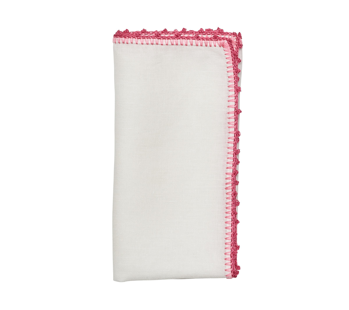 Folded view of Knotted Edge Napkin showcasing white linen and pink and blush hand crocheted edging on a white background