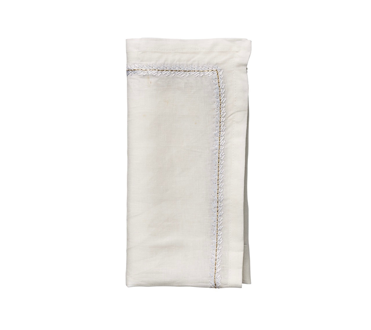 Folded view of Jardin Napkin in White, Set of 4 showcasing tonal embroidered detailing on crisp linen with a white background