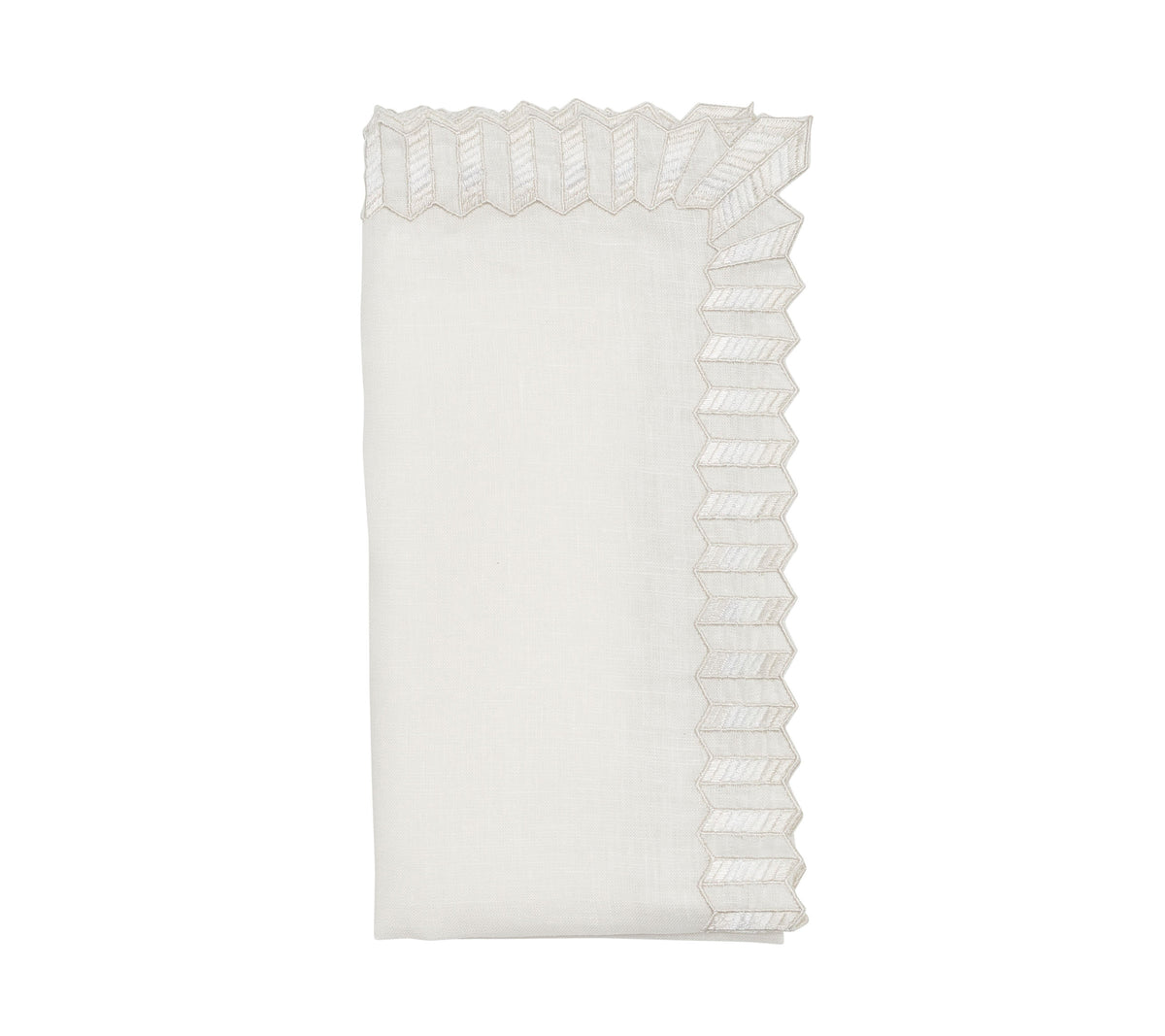 Folded view of Lumina Napkin in White, Set of 4 showcasing embroidered ombre shades and ridged edge on white background