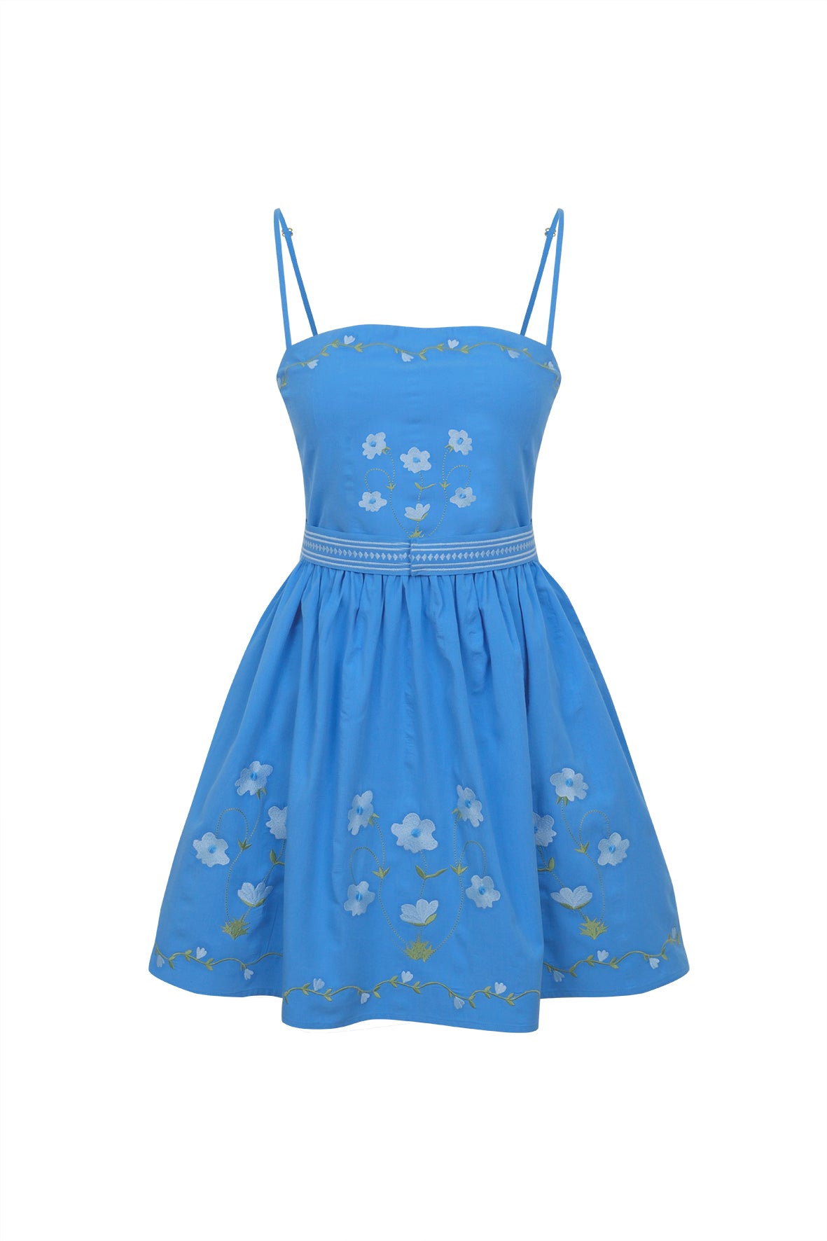 Front view of Nalan dress in light cobalt with white floral embroidery, fitted bodice and spaghetti straps on white