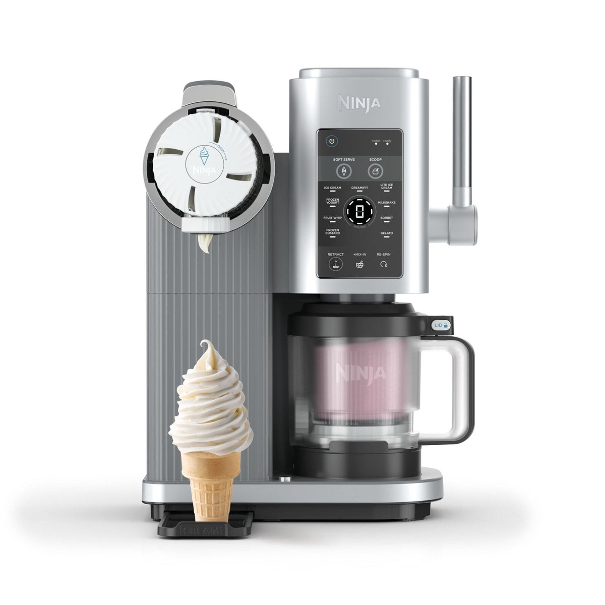 Front view of Creami Swirl 13-in-1 soft-serve ice cream machine showing nozzle dispensing a swirl cone and controls on white