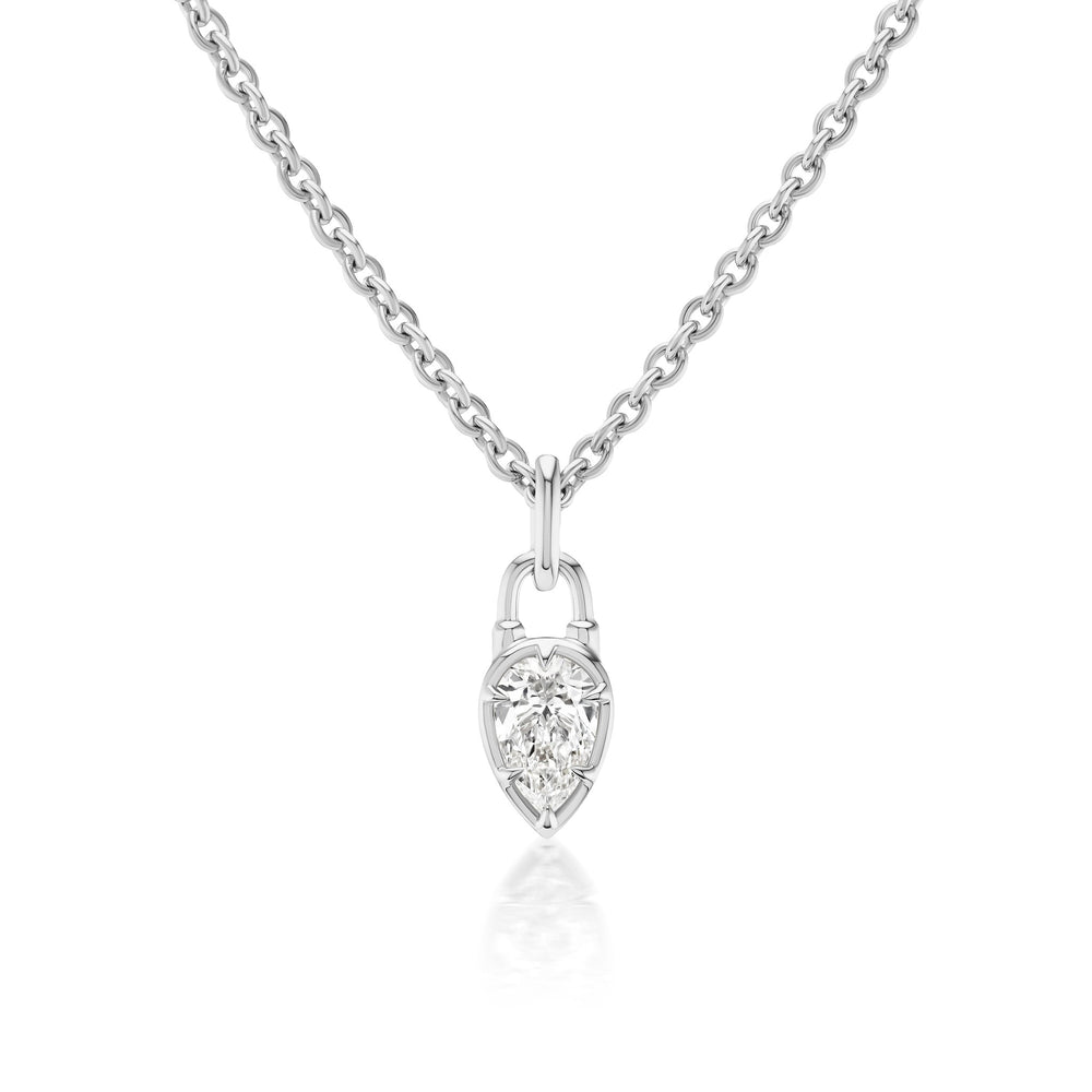 The Collet Set Locket Motif Diamond Pendant Necklace features a silver chain with a pear-shaped pendant and a sparkling center diamond, displayed against a white background.