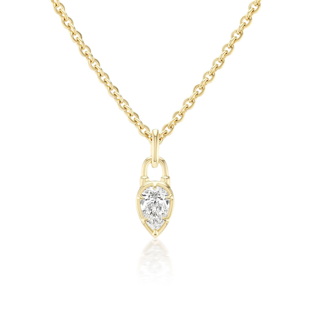 The Collet Set Locket Motif Diamond Pendant Necklace, available in yellow or white gold, showcases a pear-shaped diamond in a gold frame and is pictured against a white background.